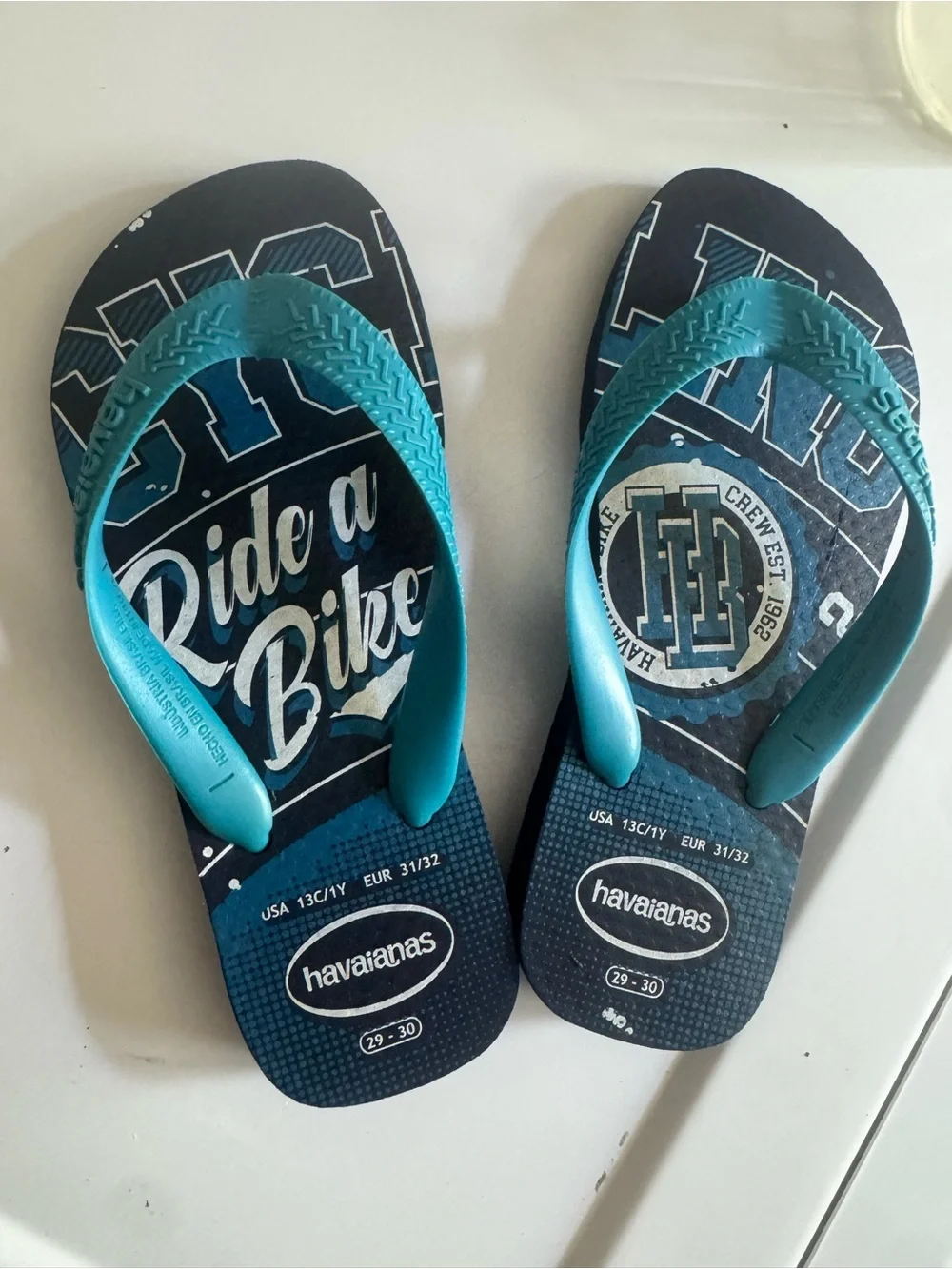 Havaianas Kids Navy Flip Flops with Teal Straps size youth 13-1 BR/EU 29-30